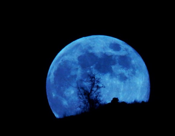 EarthSky An older definition describes a blue moon as the third of four full moons in a single season
